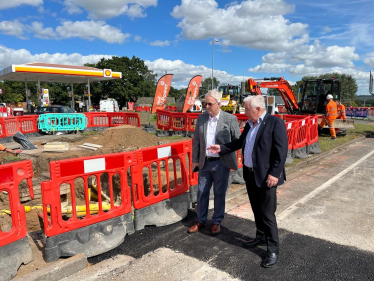 Cllr Strengiel and Cllr Briggs discussing the development at the Birchwood Avenue, Skellingthorpe Road junction.